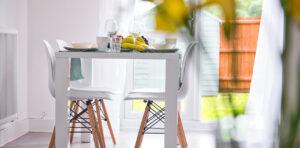 A bright and airy dining area in an apartment