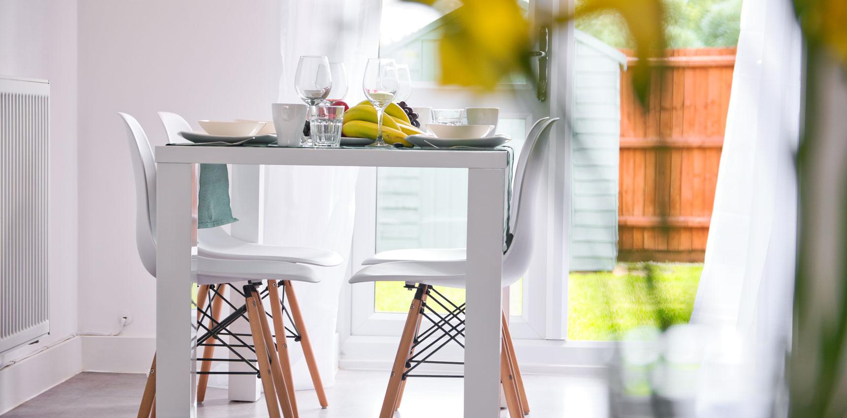 A bright and airy dining area in an apartment