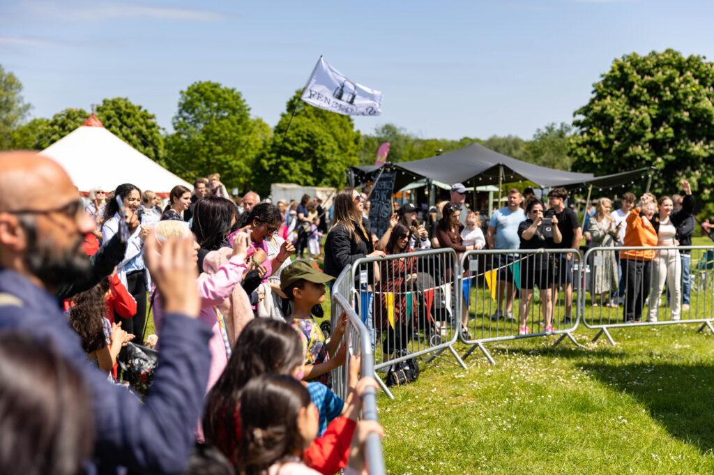 many people enjoying activities at a festival in Ferry Meadows Peterborough